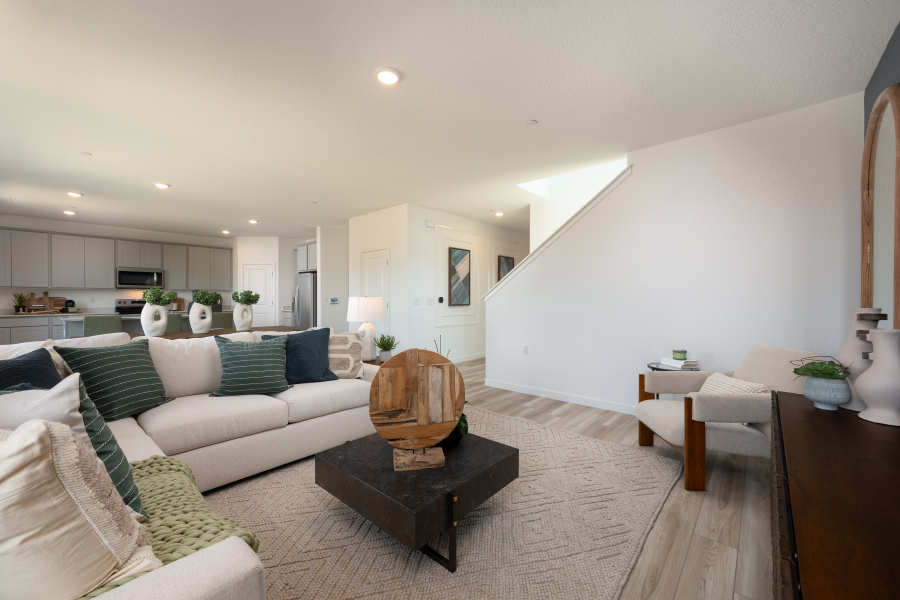 A living room with a couch and a coffee table.