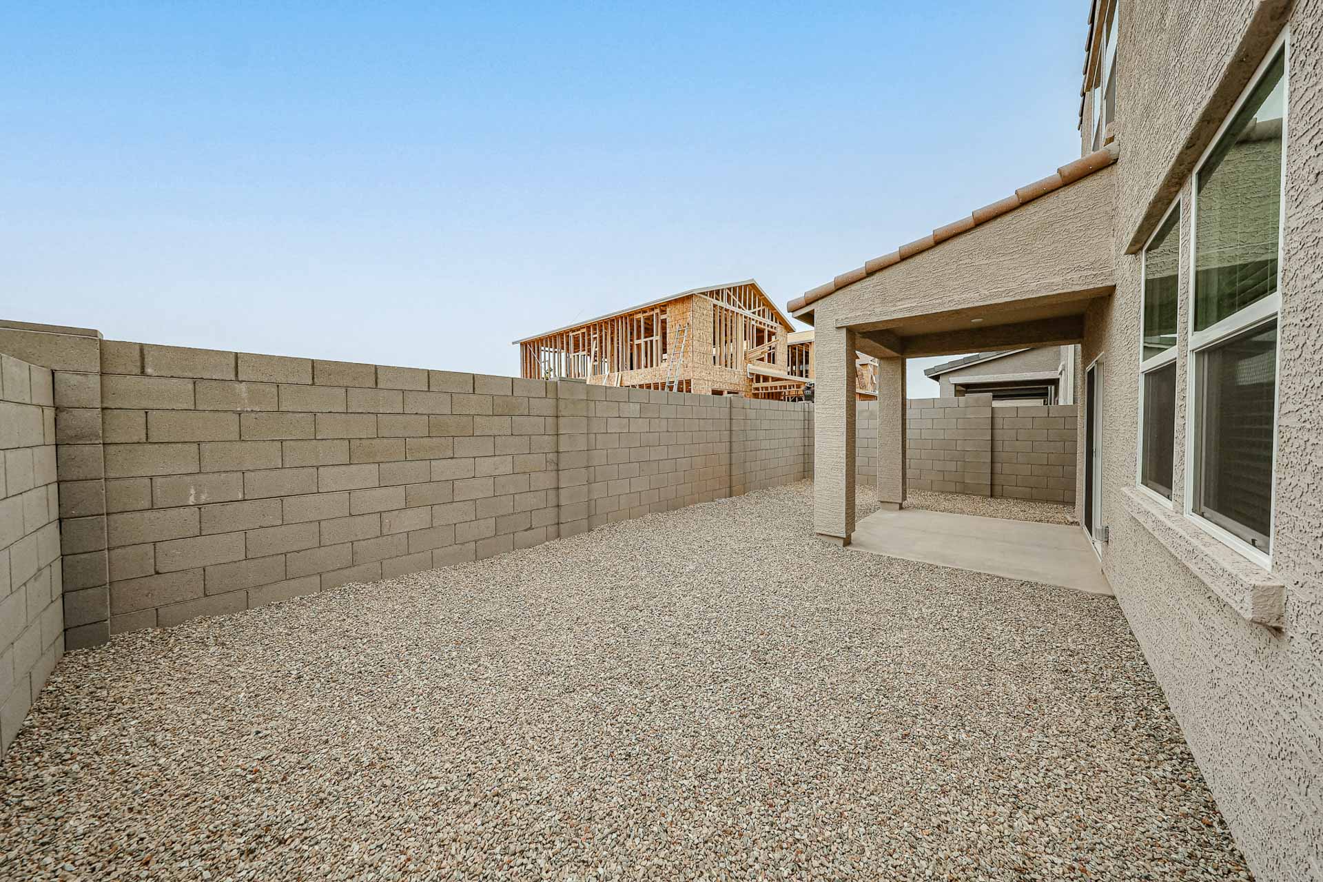 A building with a stone wall.