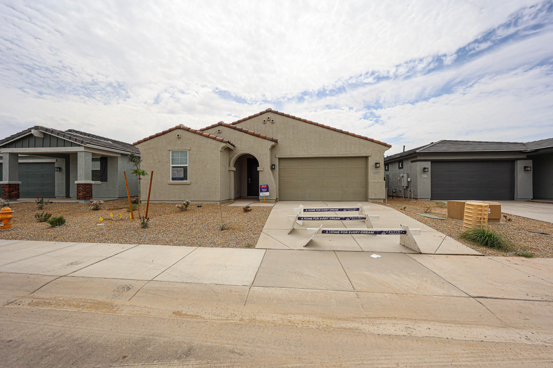 A building with a sign in front of it.