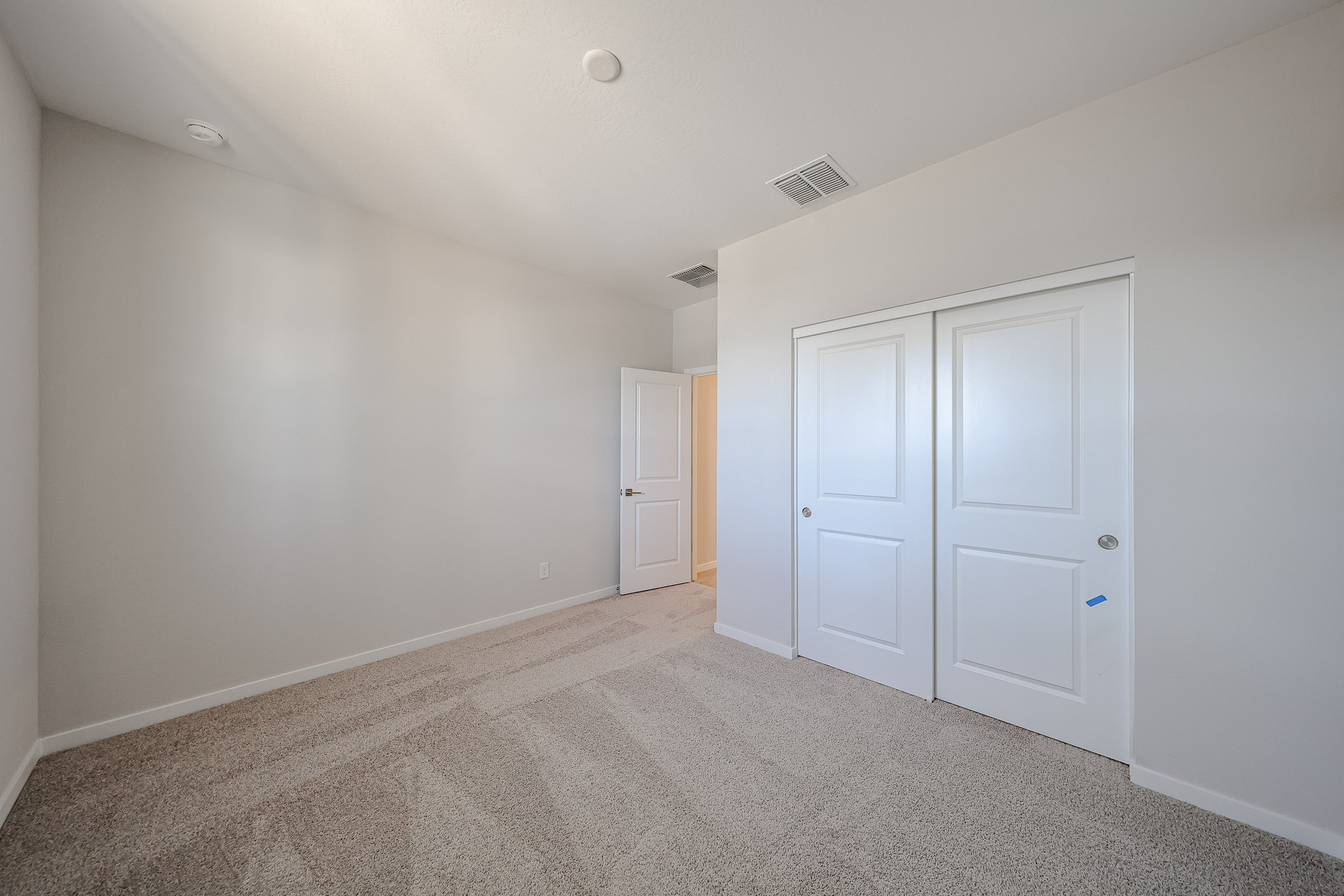 A room with white doors.