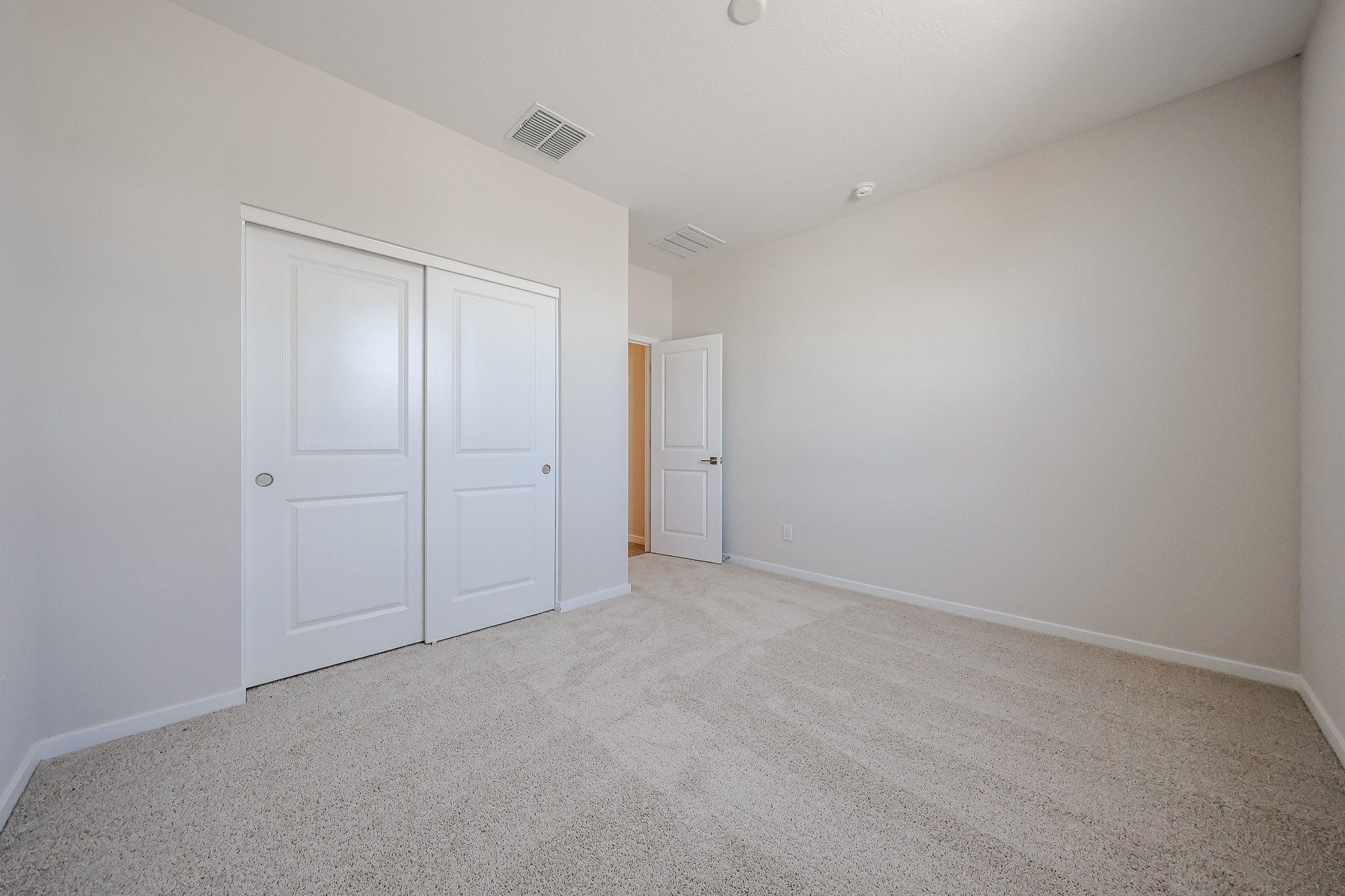 A room with white doors.