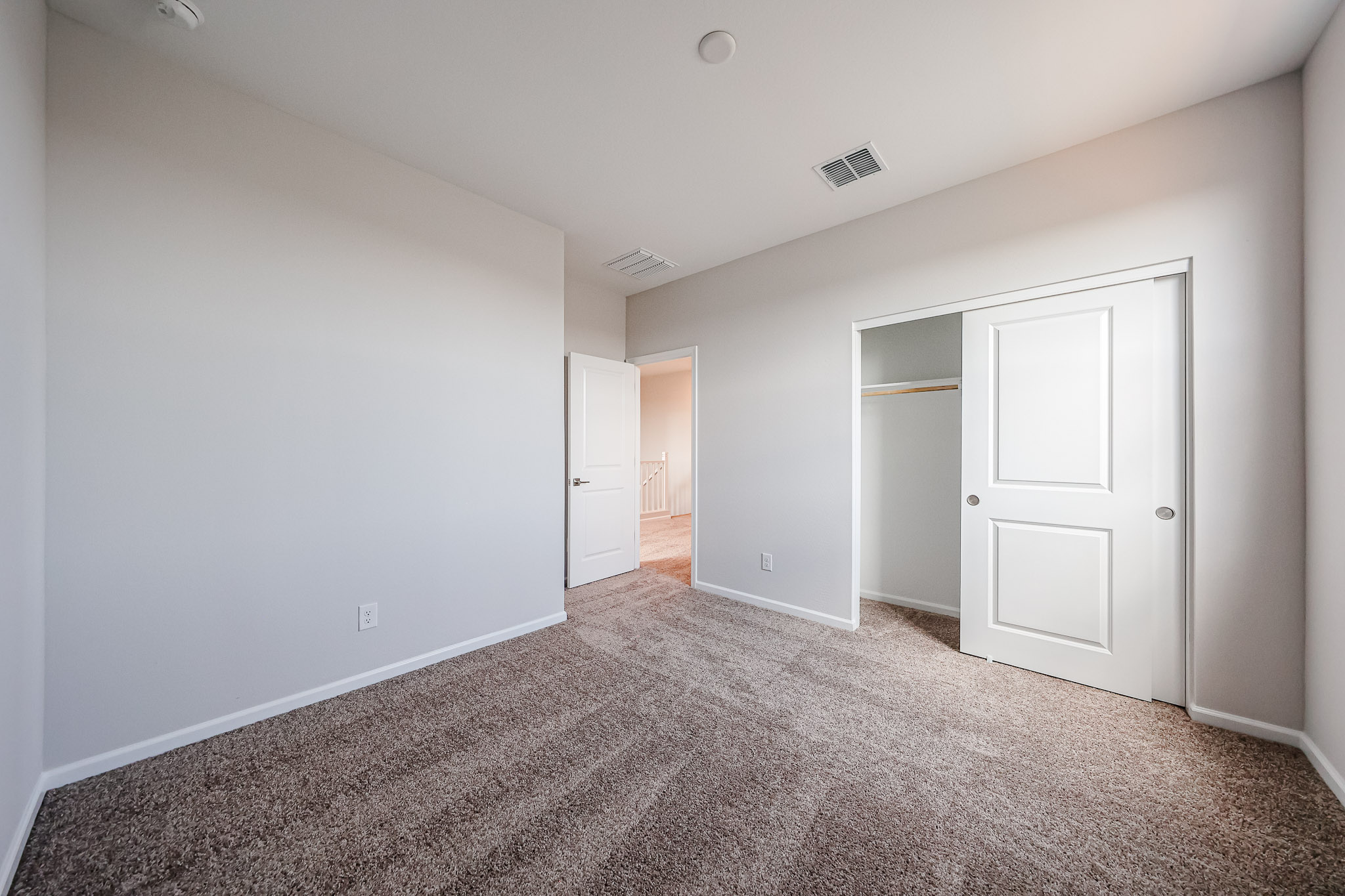 A room with white doors.