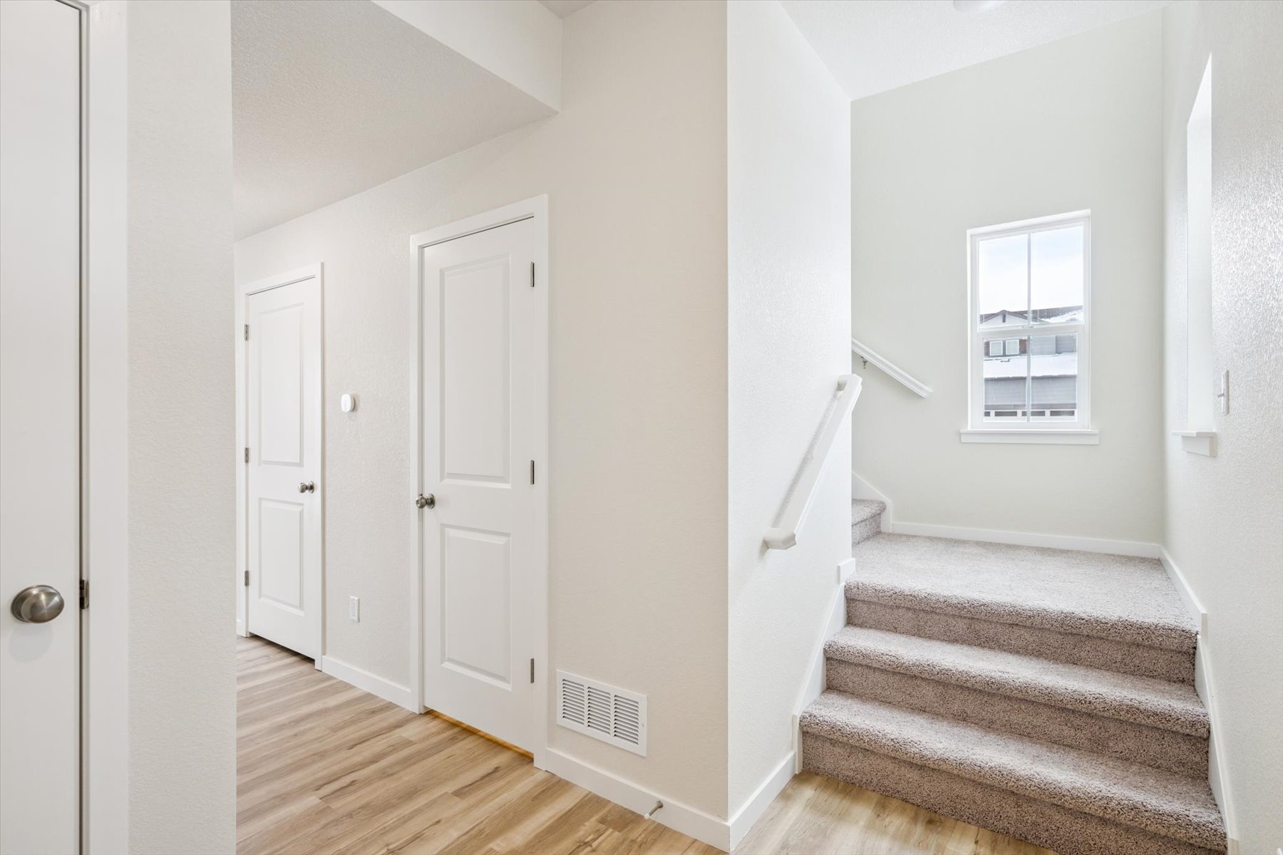 A room with white doors.