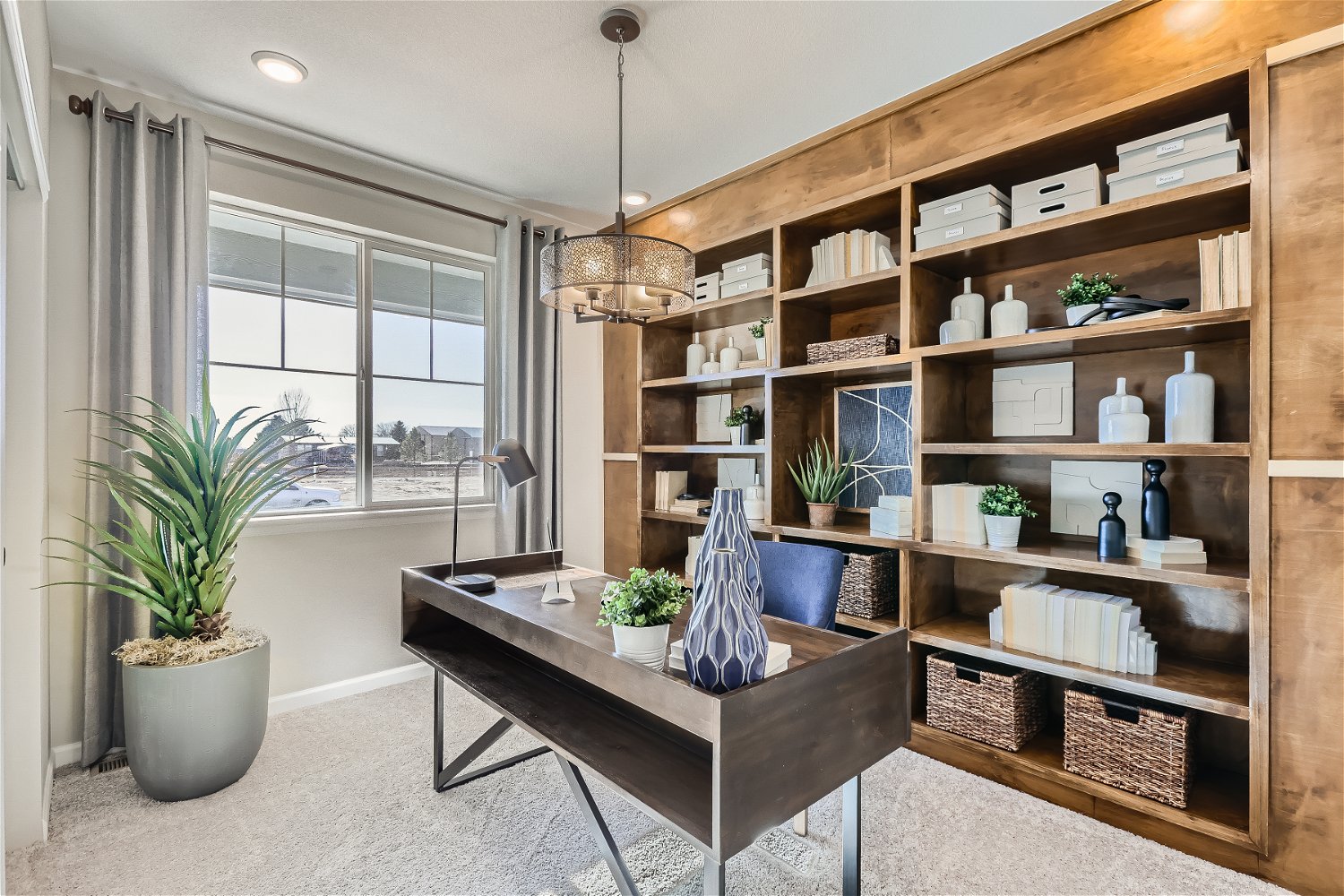 A room with shelves and a table.