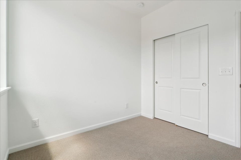 A room with white doors.