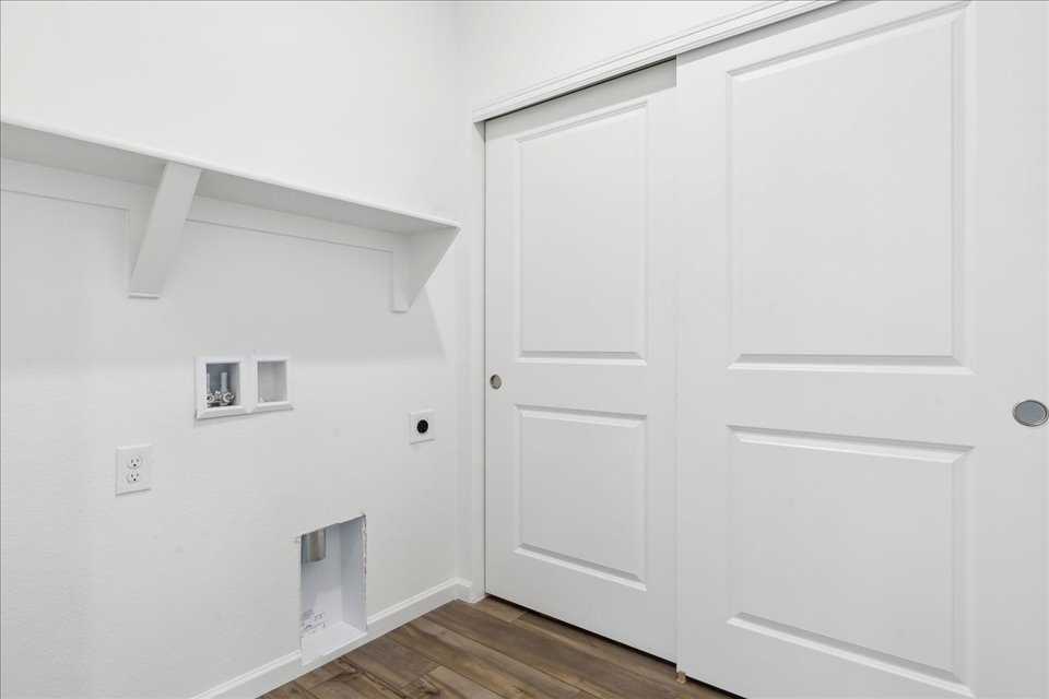 A white wall with white doors.