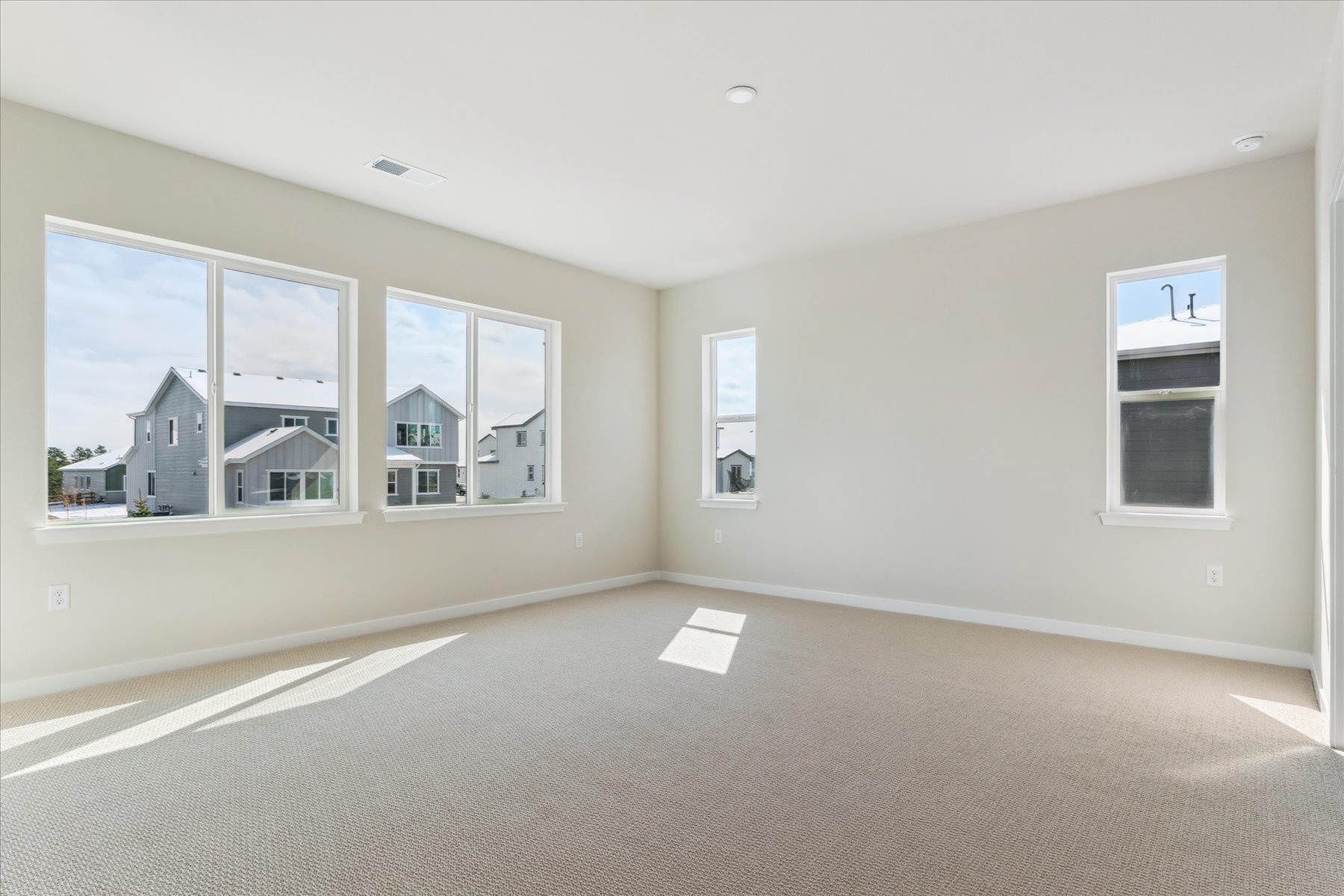 A room with a large window.