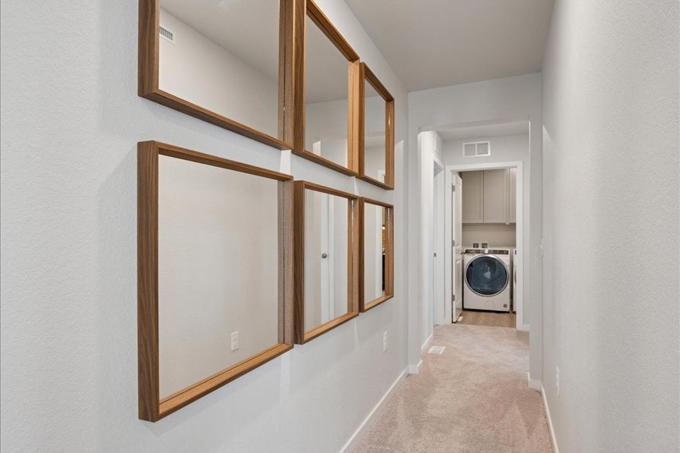 A mirror is on the wall.