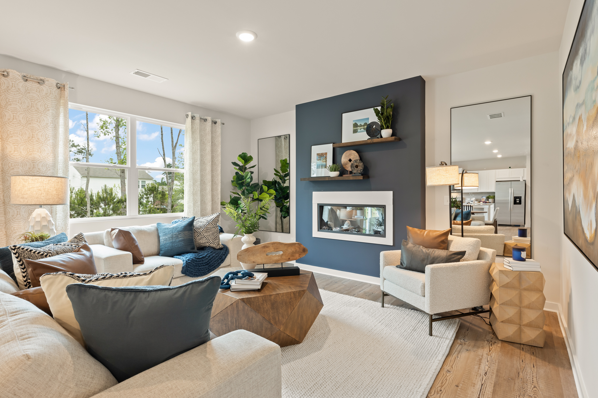 A living room with a fireplace.