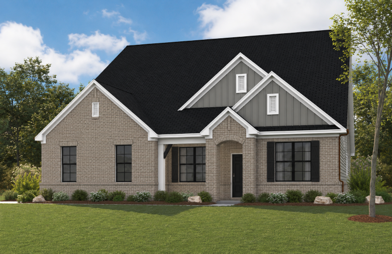 A house with a lawn in front of it.