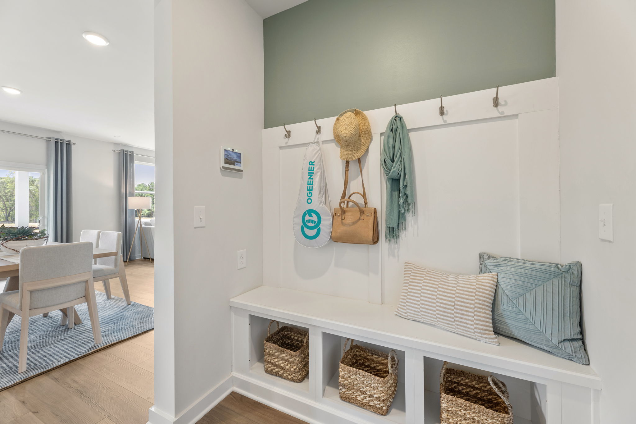 A room with a bed and a chair.