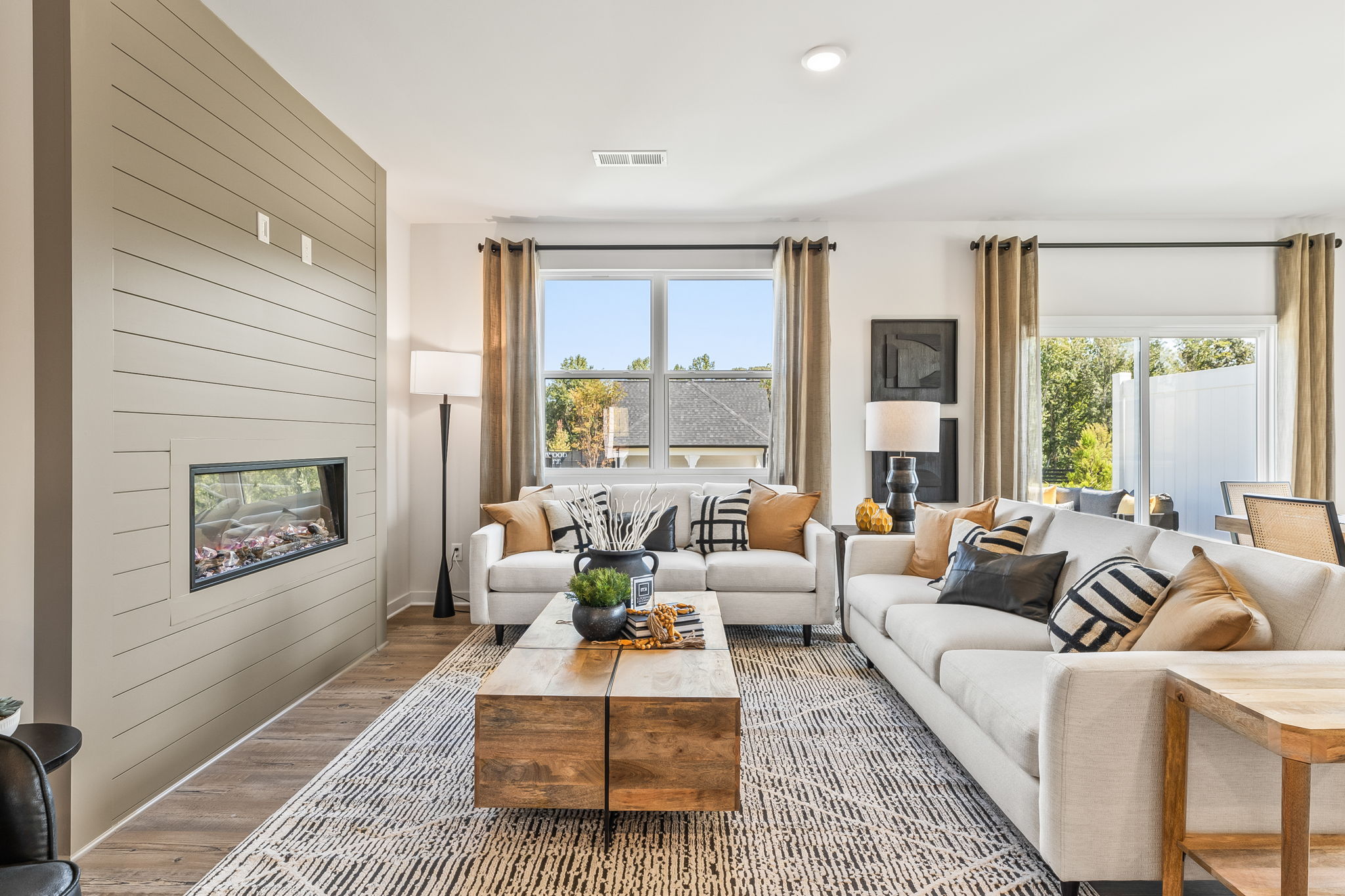 A living room with a large window.