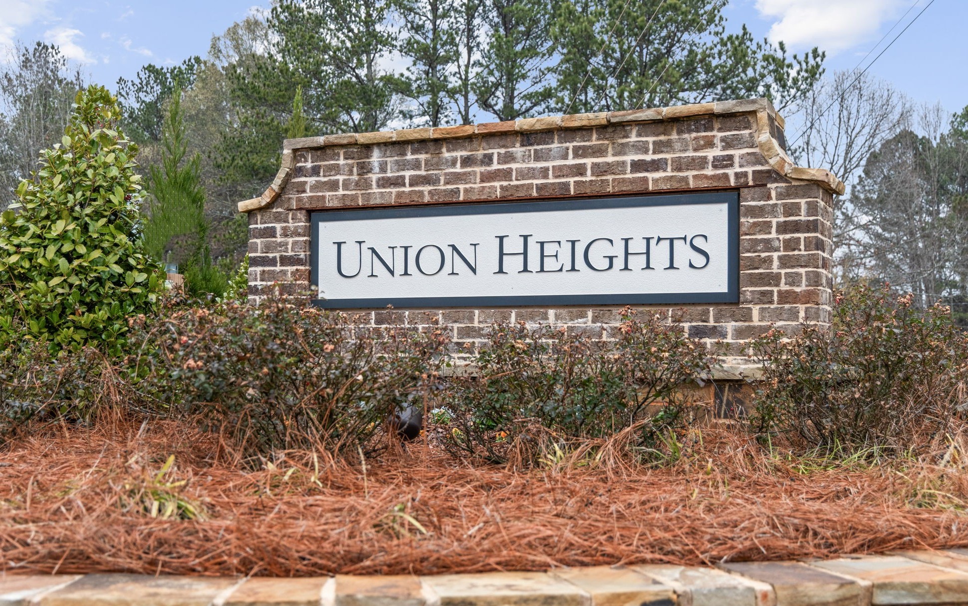 A sign on a brick building.