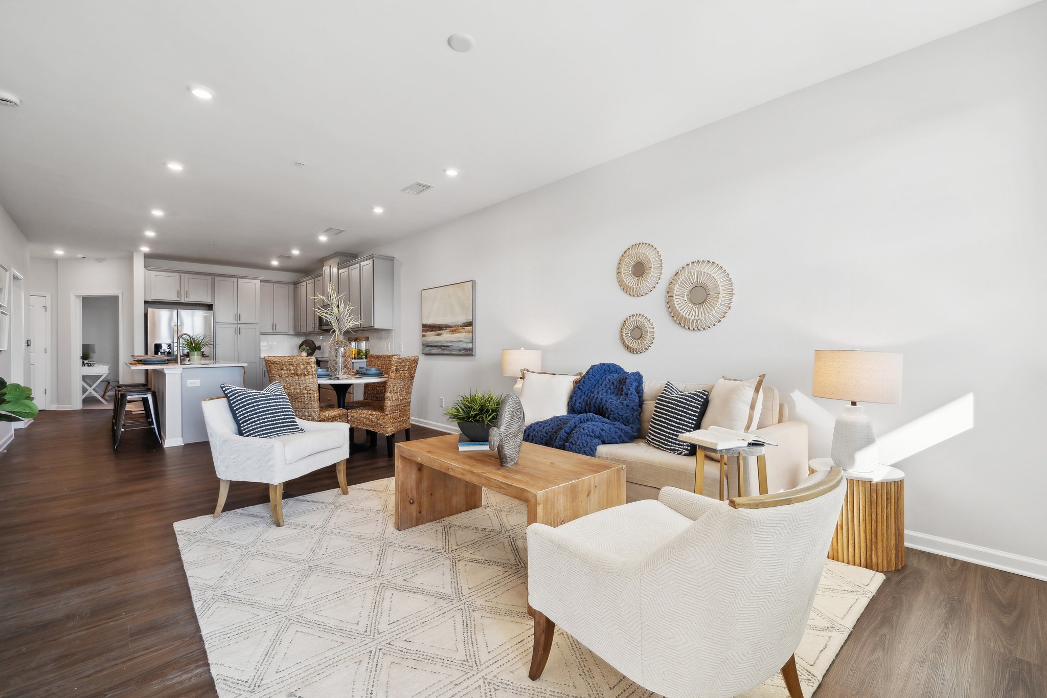 A living room with a wood floor.