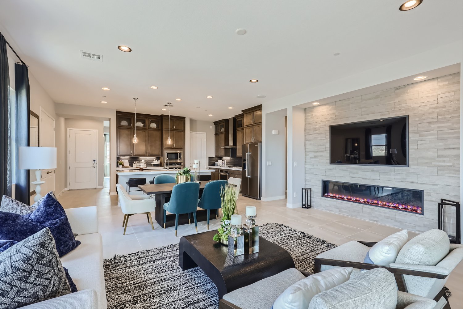 A living room with a fireplace.