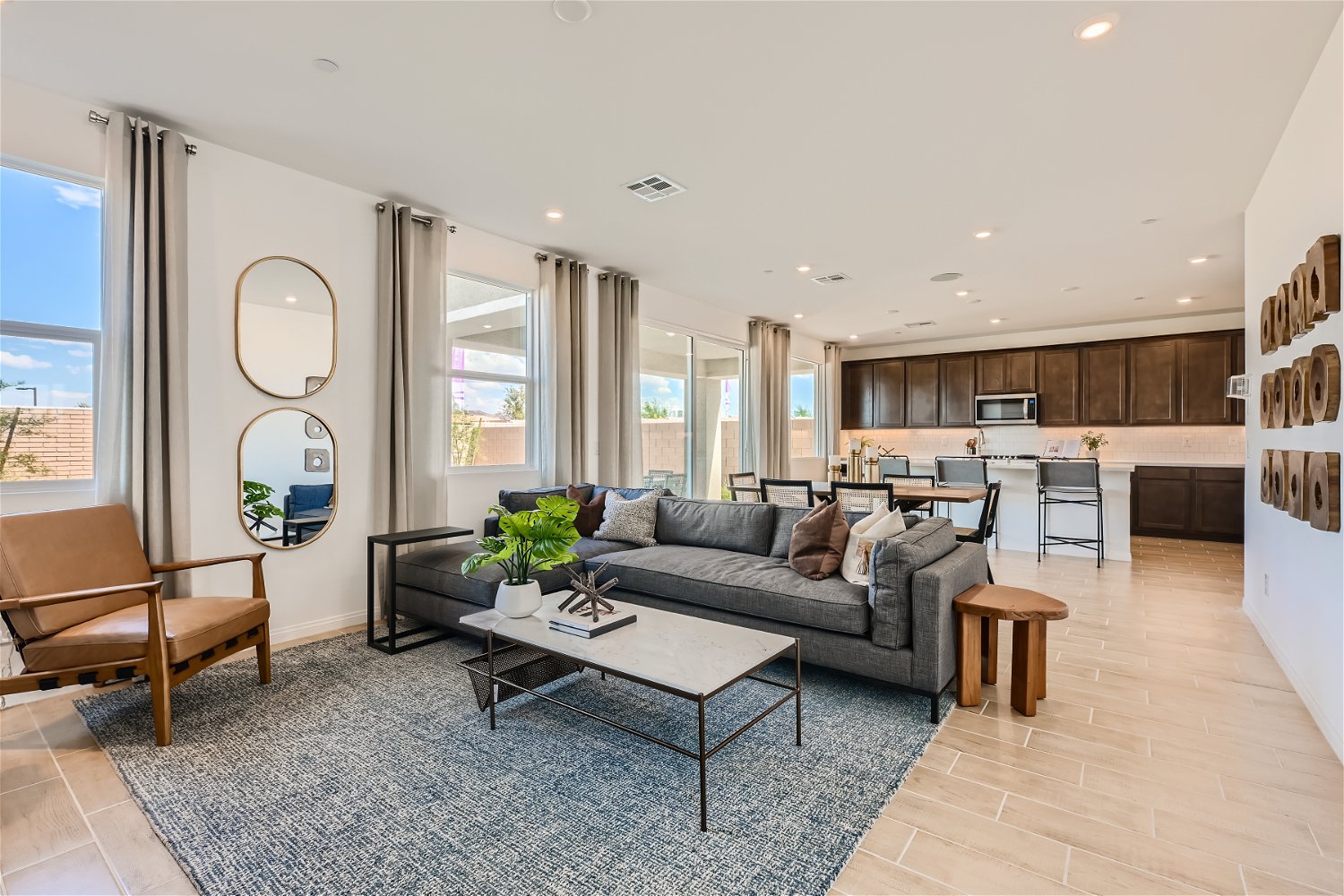 A living room with a couch and a table.
