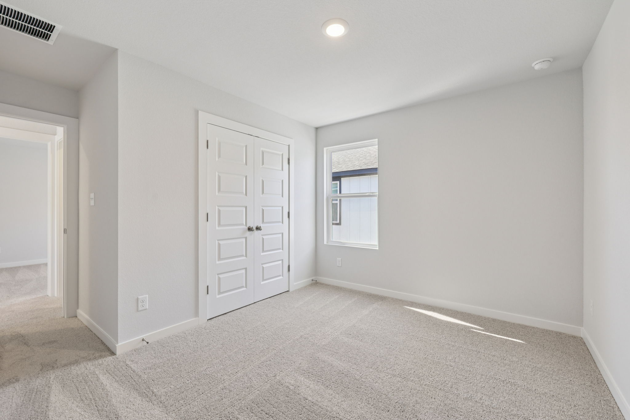 A room with white doors.