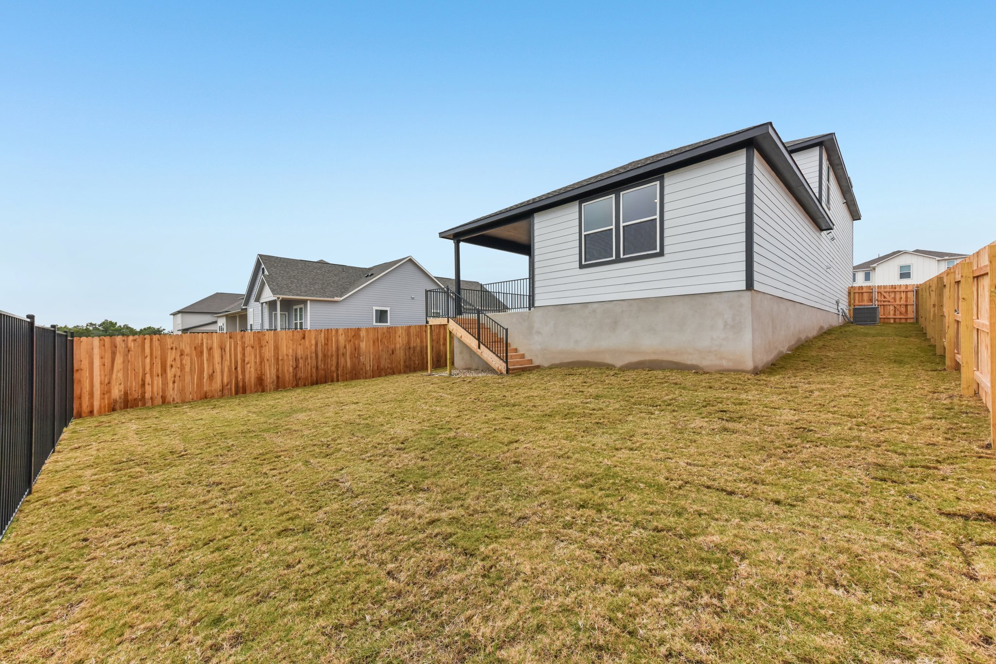 A house with a fence around it.