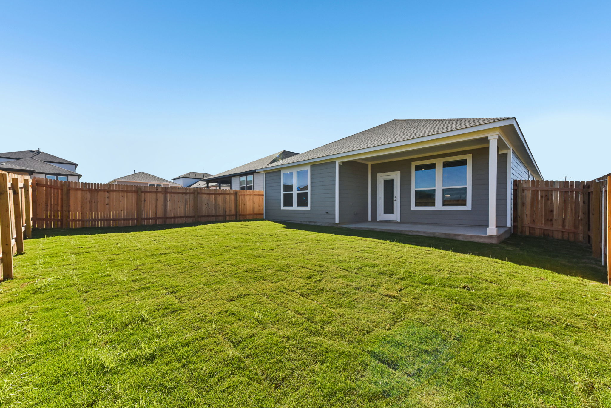 A house with a fence around it.