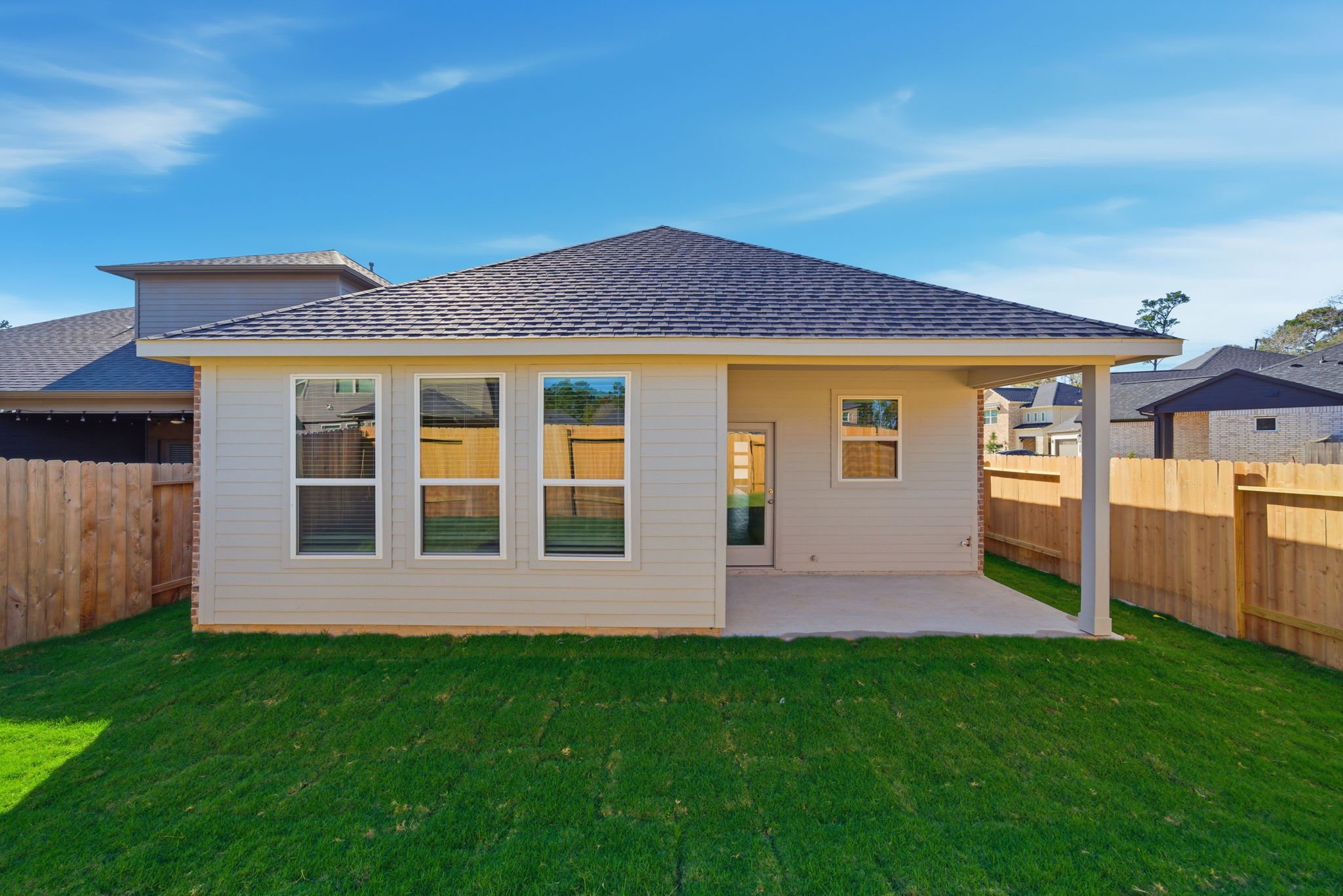 A house with a fence around it.
