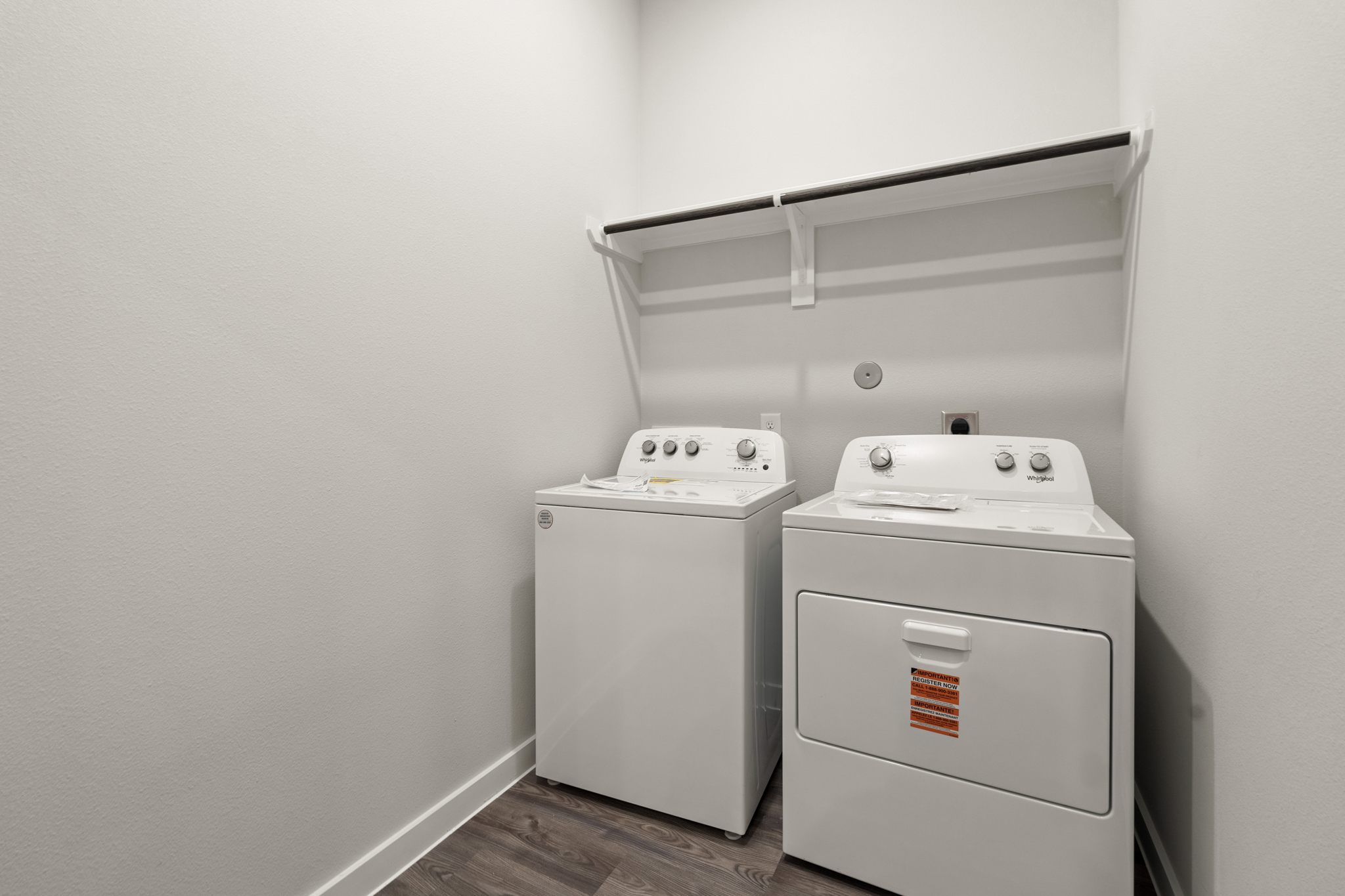 A washing machine in a room.