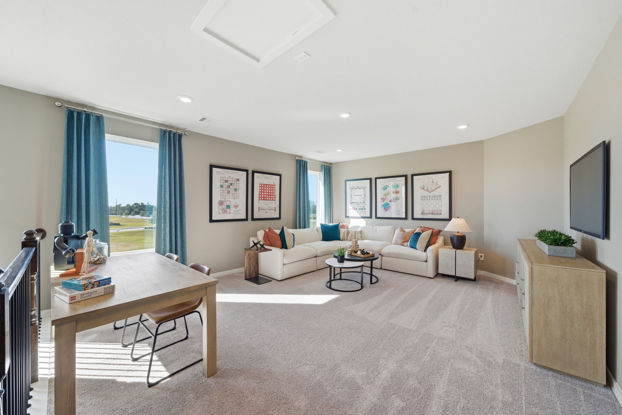 A living room with a large window.