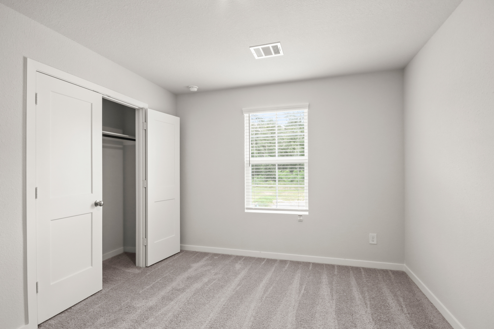 A room with white doors.