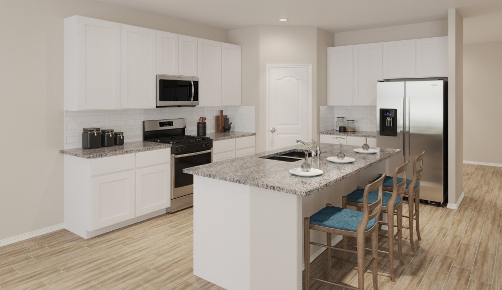 A kitchen with white cabinets.