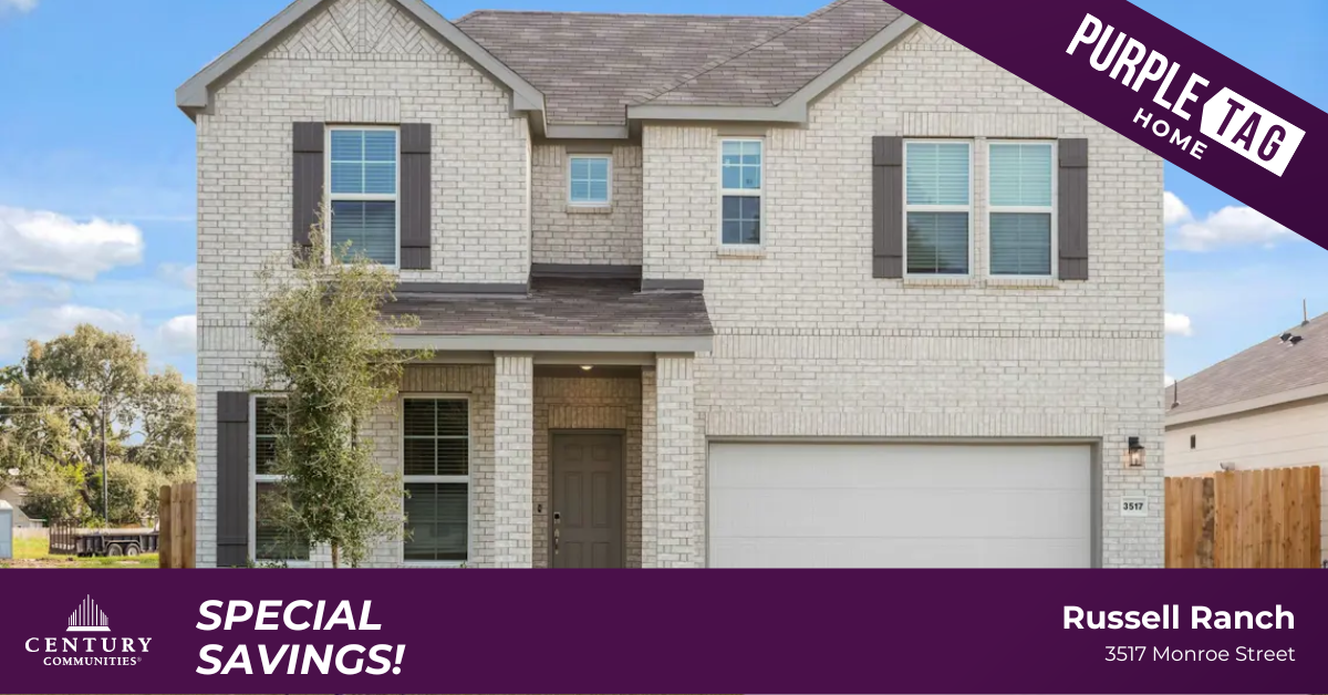 A brick building with a garage.