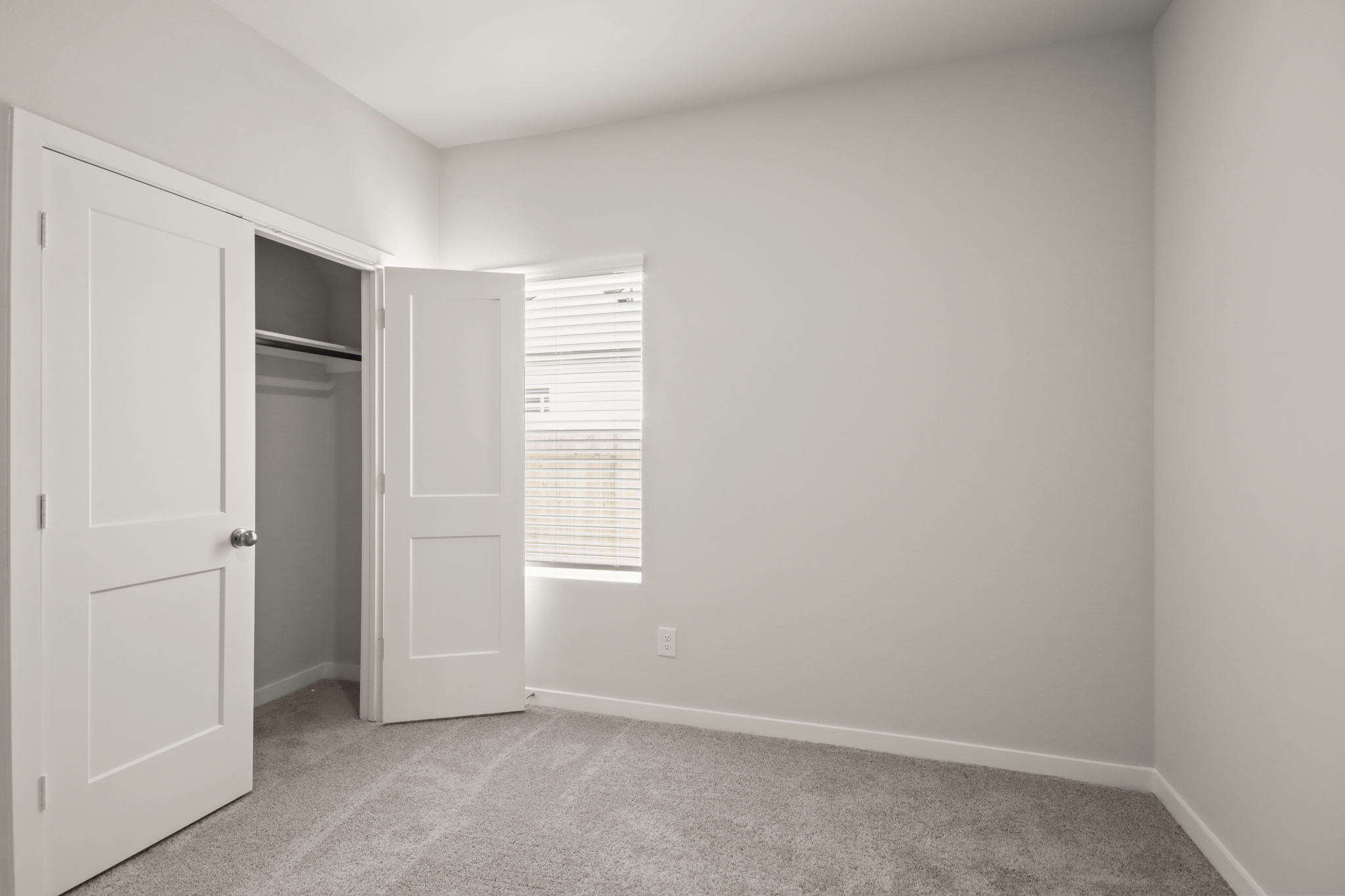 A room with white doors.