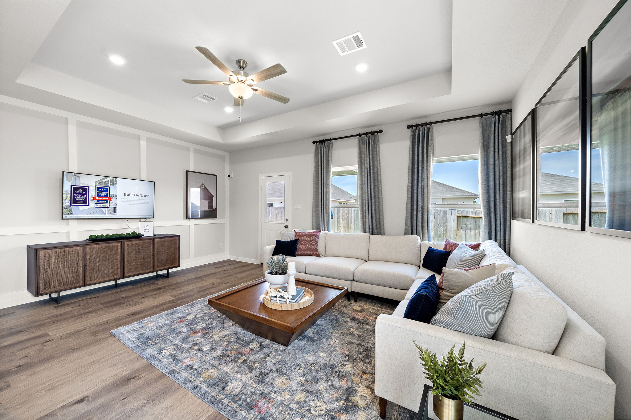 A living room with a large window.
