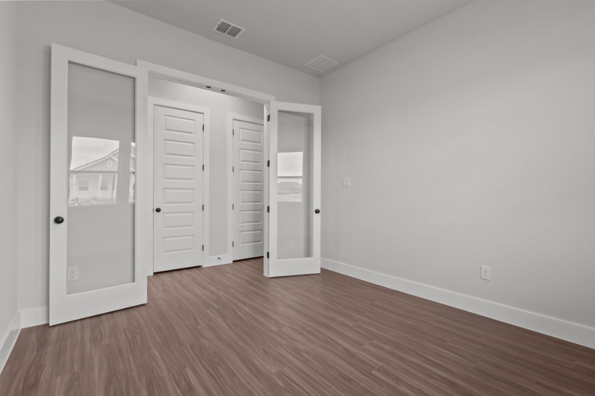 A room with white doors.