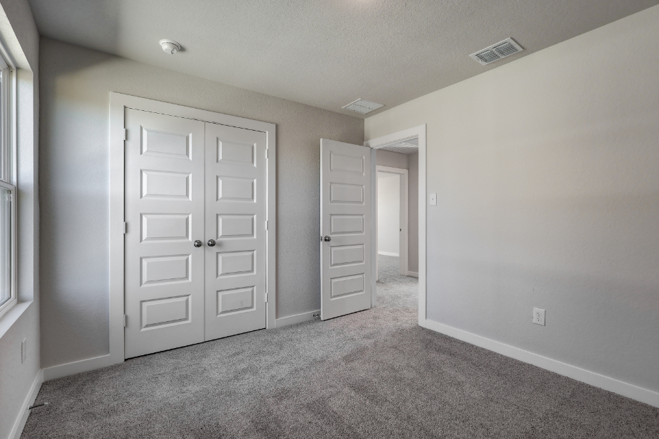 A room with white doors.