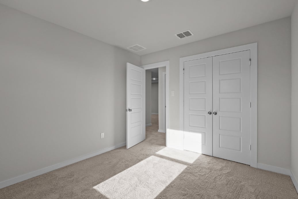 A room with white doors.