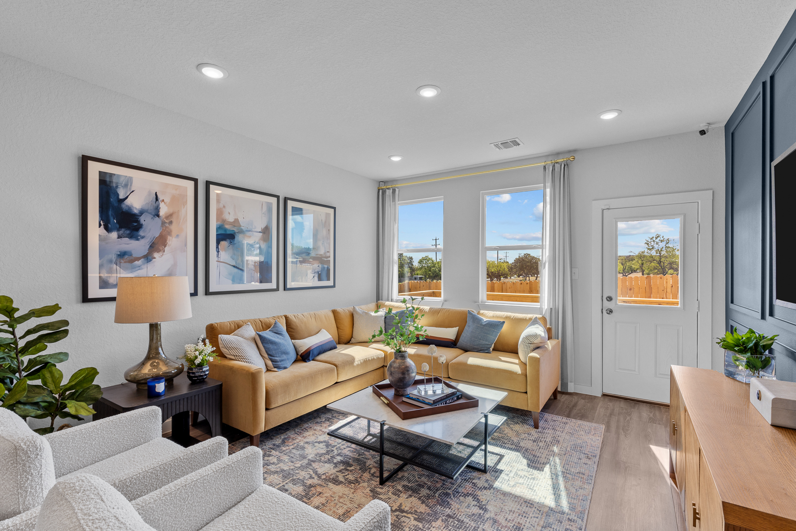 A living room with a large window.
