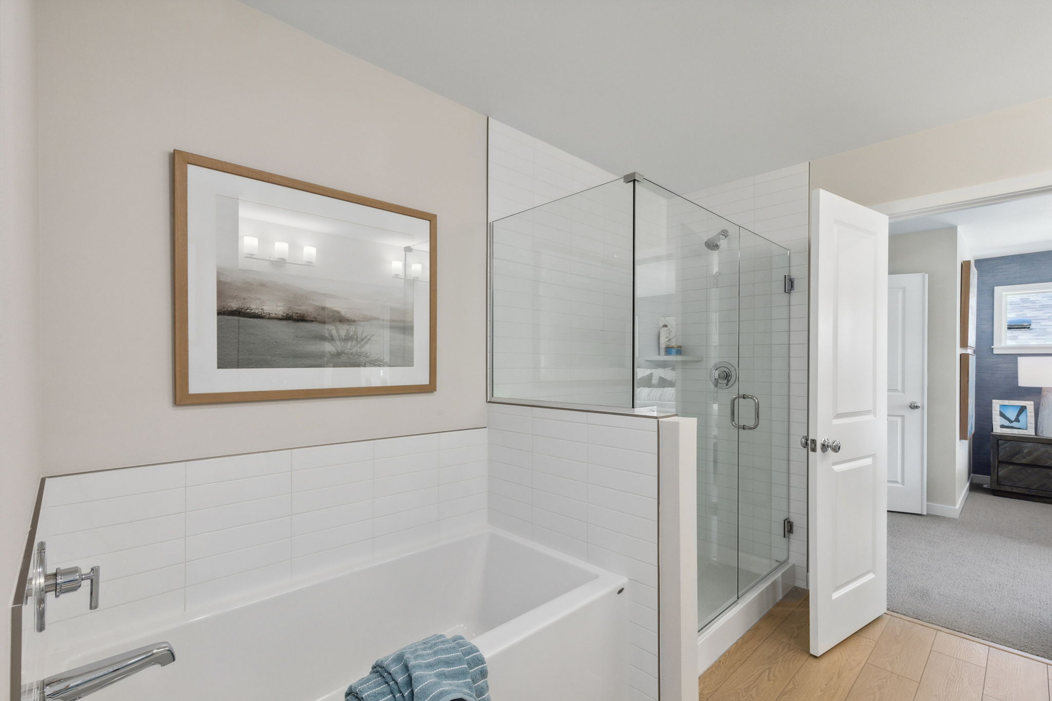 A bathroom with a glass shower.