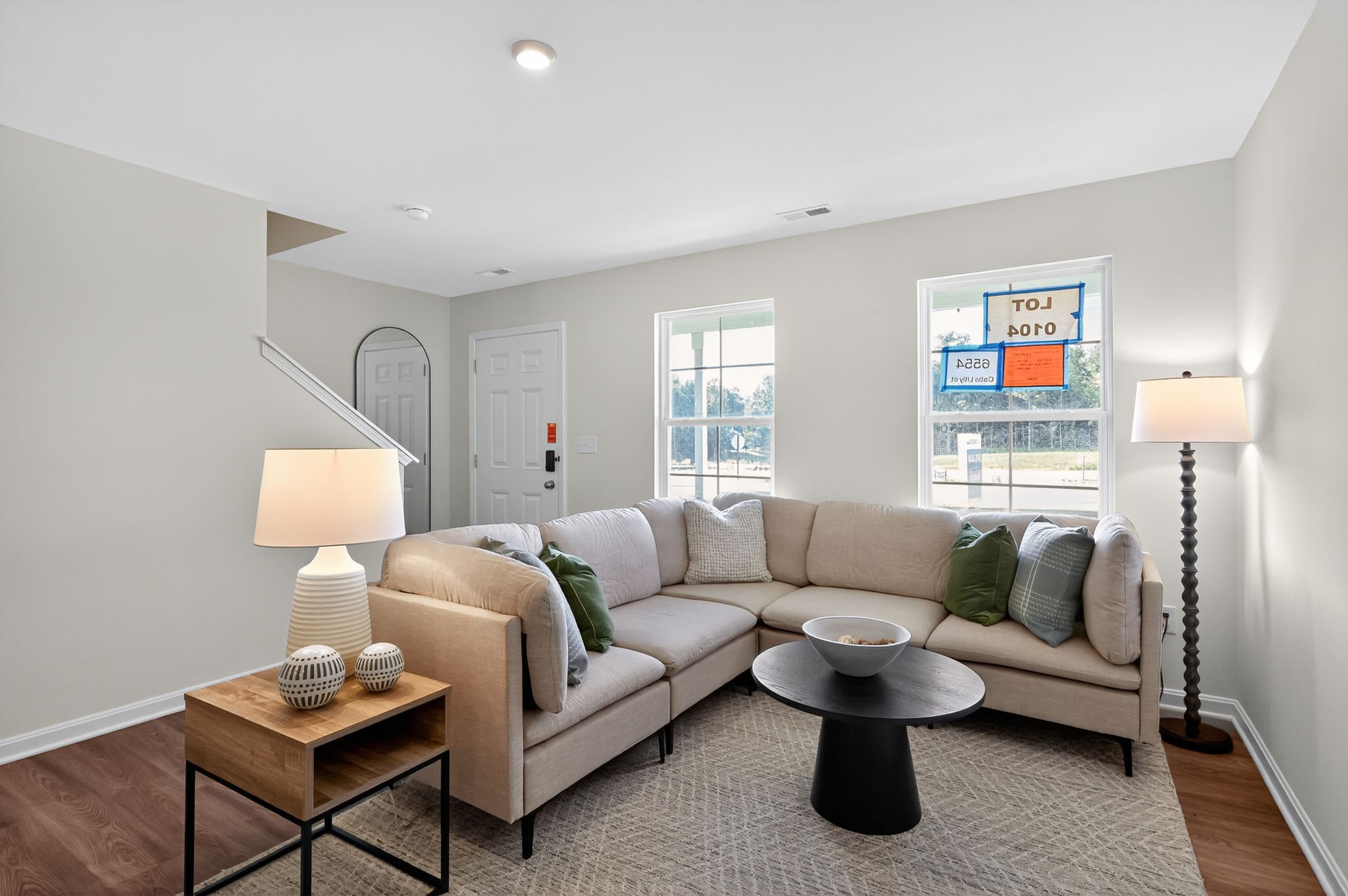 A living room with a couch and a coffee table.