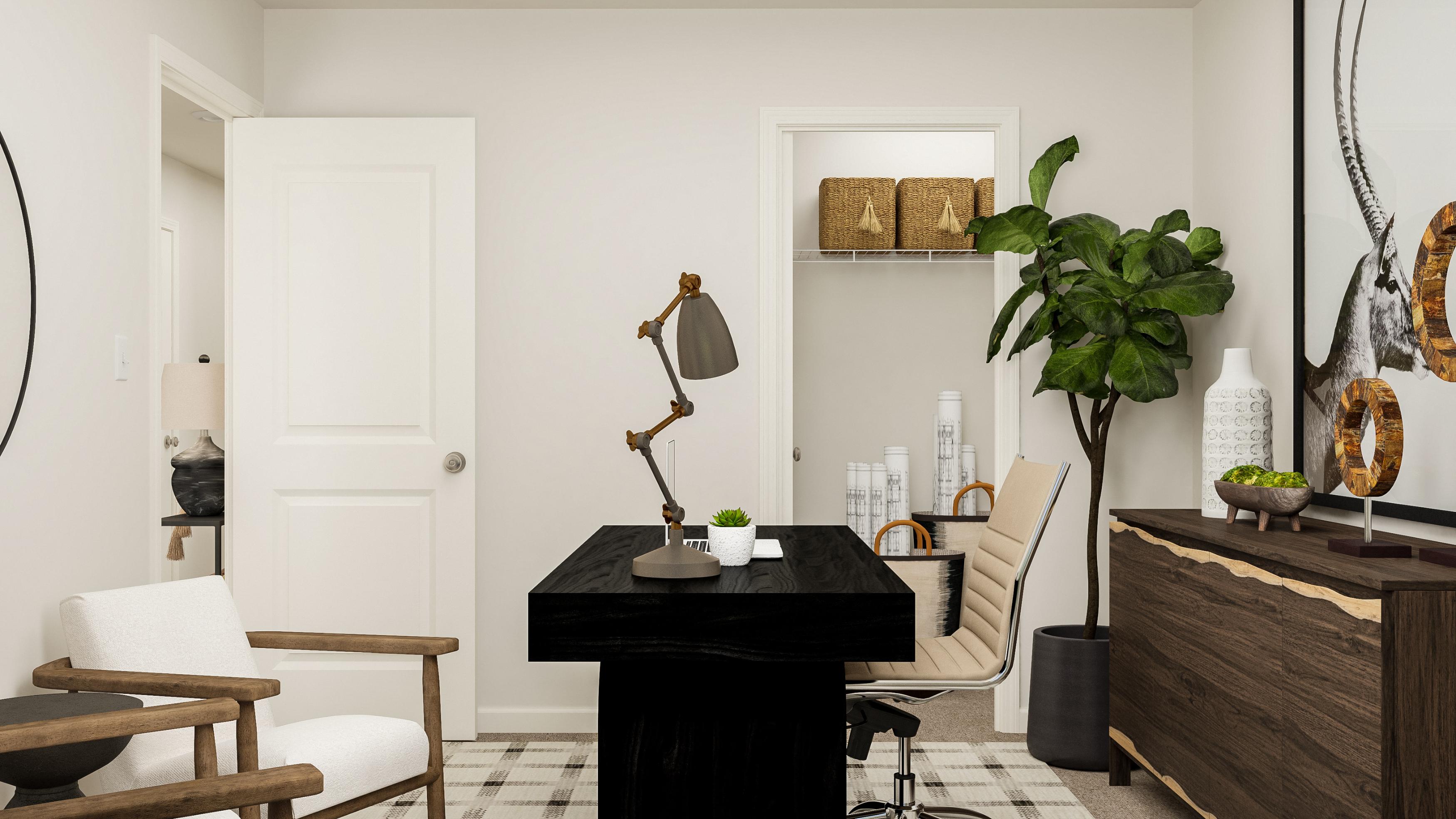 A room with a piano and chairs.