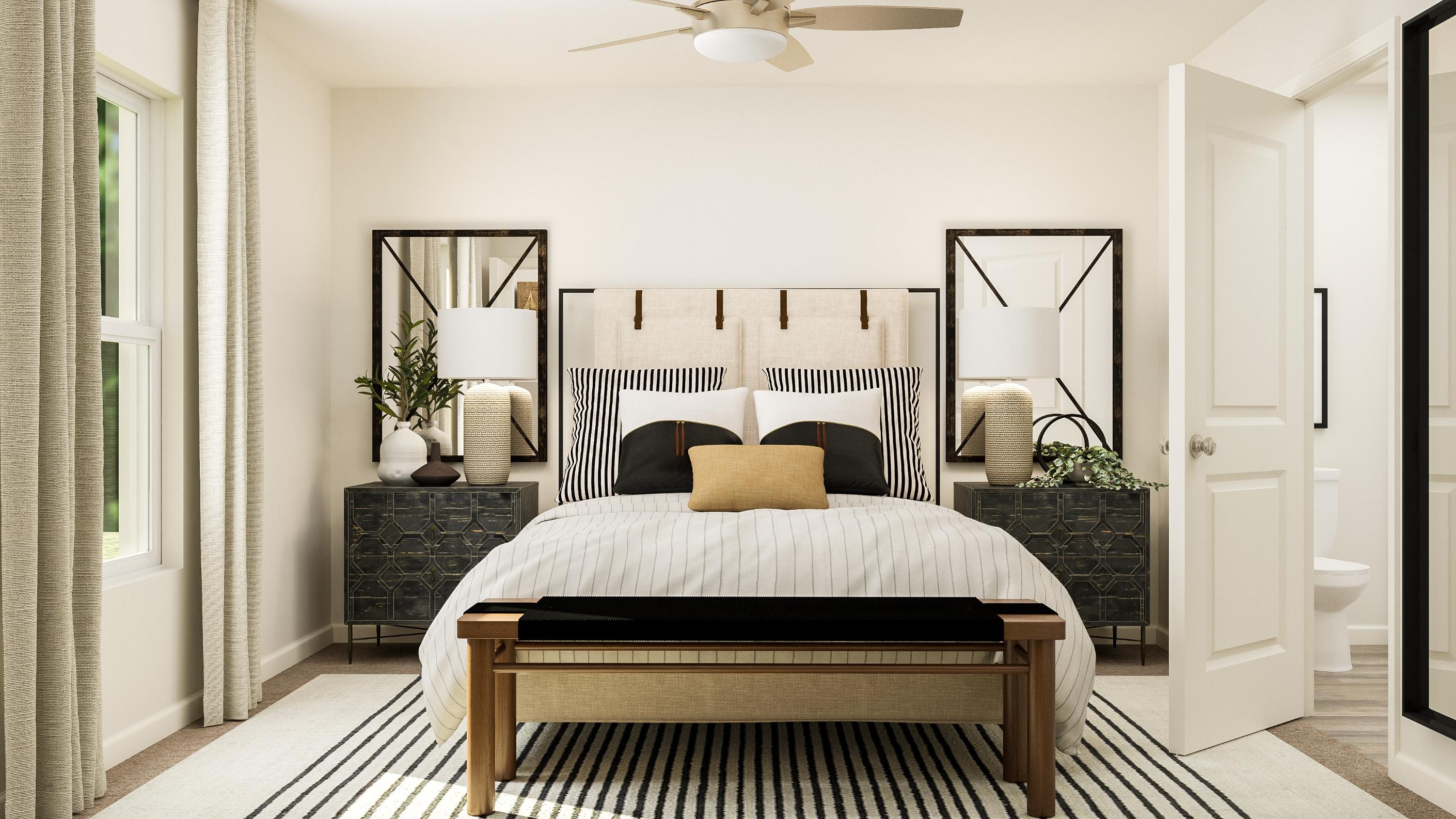 A bedroom with a large bed.